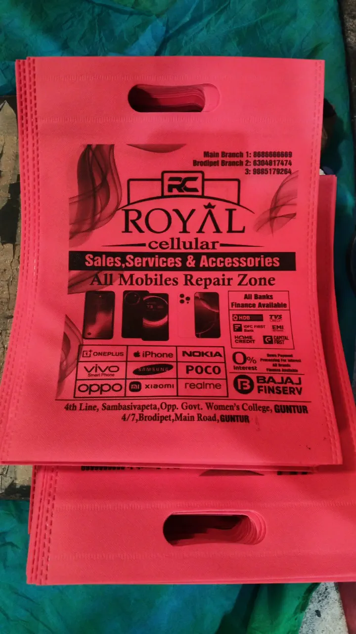 Pink D-cut non woven bags printed in black for a mobile repair shop