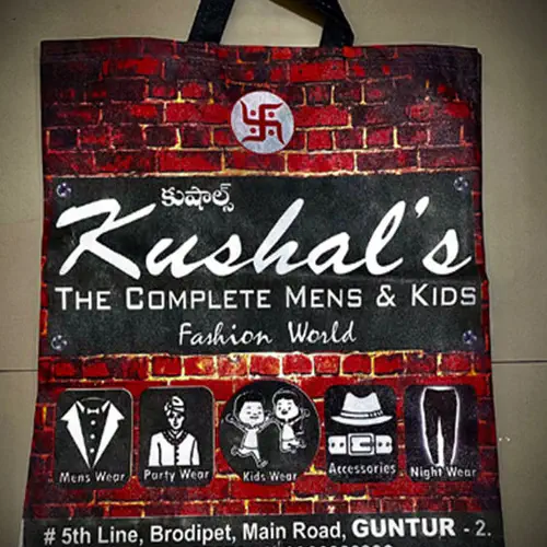 Loop handle non woven bag with dark full surface printing, made for a menswear store in Guntur