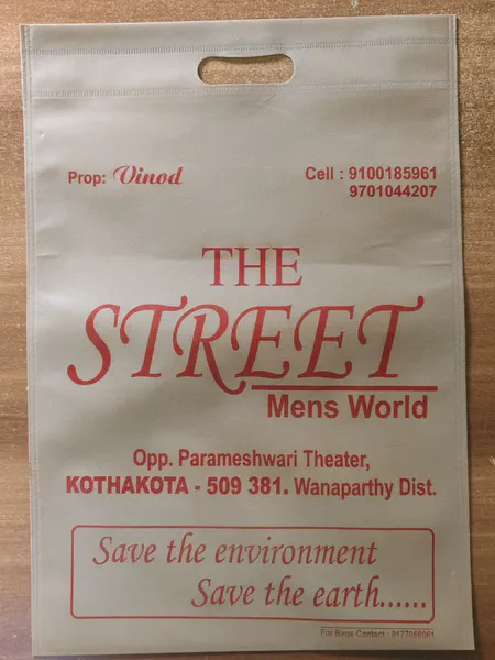 Printed D-cut bag for a menswear store in Kothakota, Wanaparthy district