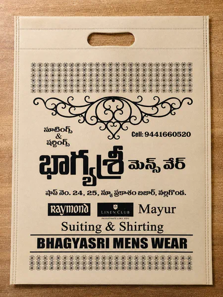 Printed D-cut bag for a menswear shop in Nalgonda