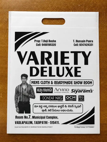 Printed D-cut bag for a menswear showroom in Tadipatri