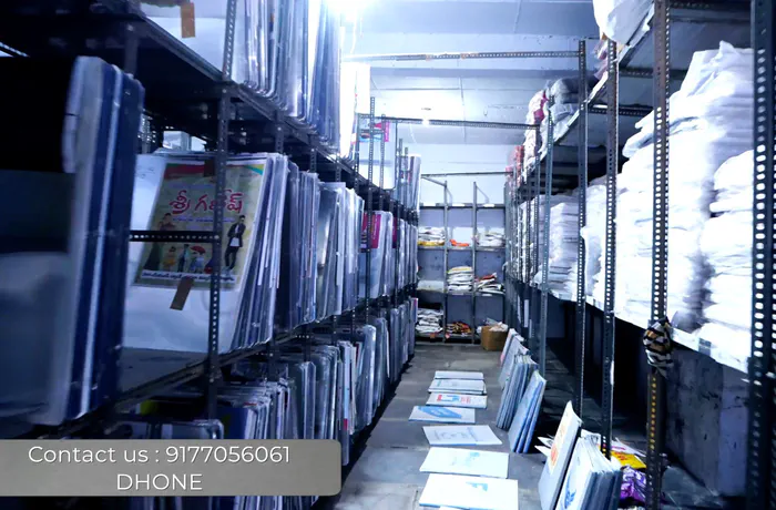 Storage racks holding printing screens and stacks of finished non-woven bags ready for despatch